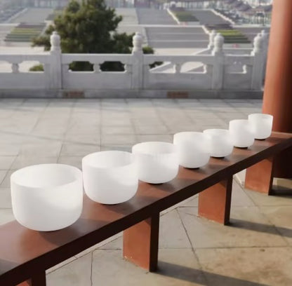 Set of 7 White Crystal Singing Bowls in Beige Bags
